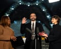 Zohran Mamdani being sworn in by Attorney General Letitia James, left, alongside his wife Rama Duwaji, right, in a former subway station