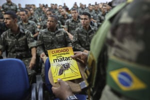 In Sao Paulo, Brazil, members of the army are briefed on the distribution of leaflets about the deadly mosquito
