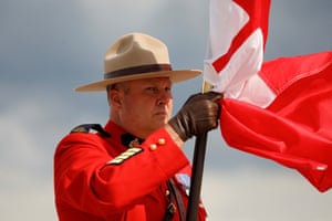 an officer holding a flag