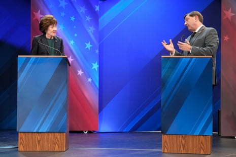 Troy Jackson questions Sen. Susan Collins at podiums during the Maine Senate debate