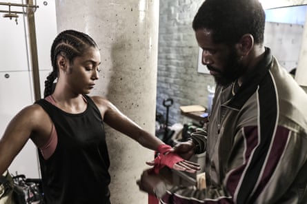 Jasmine Jobson as Ali getting her hand bound by Gershwyn Eustache Jr as Clinton in In the Shadows