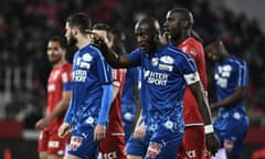 FBL-FRA-LIGUE1-DIJON-AMIENS<br>Match is interrupted and Amiens’ French defender Prince Desir Gouano (C) points supporters after hearing racists insults during the French L1 football match between Dijon (DFCO) and Amiens on April 12, 2019 in Gaston Gerard stadium in Dijon. (Photo by JEFF PACHOUD / AFP)JEFF PACHOUD/AFP/Getty Images