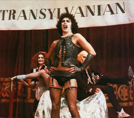 Tim Curry in suspenders and corset in The Rocky Horror Picture Show