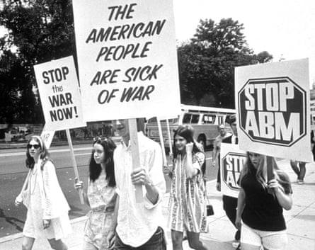 Students march with anti-war placards on the campus of the University of California at Berkeley in 1969.