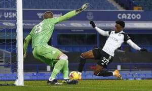 Fulham’s Josh Maja, right, scores the opening goal.