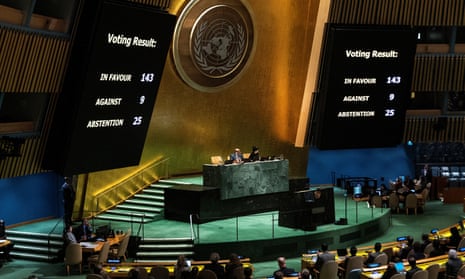 Screens show the voting result during the vote on a resolution to bestow full membership to the state of Palestine.