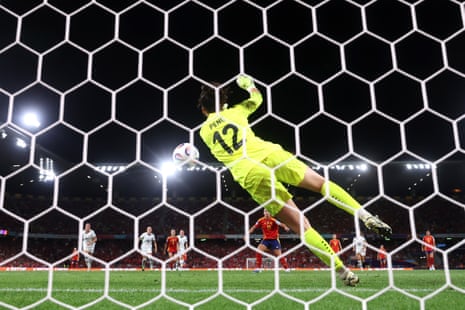 Livia Peng of Switzerland saves a penalty, taken by Alexia Putellas