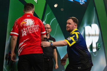 Luke Littler reaches out to Krzysztof Ratajski after their quarter-final