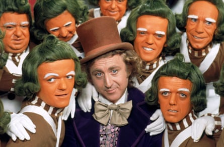 Gene Wilder with the actors playing the Oompa Loompas in Willy Wonka & the Chocolate Factory (1971).