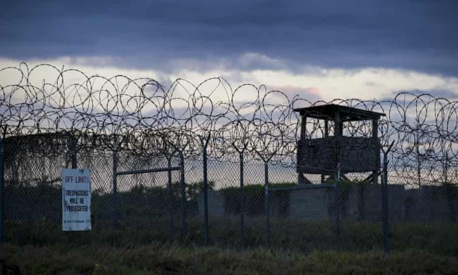 The sun sets behind the closed Camp X-Ray detention facility on April 2019 in Guantanamo Bay Naval Base, Cuba.