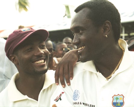 A smiling Brian Lara leans on Carl Hooper after his 153 led to a one-wicket win for West Indies over Australia in Barbados