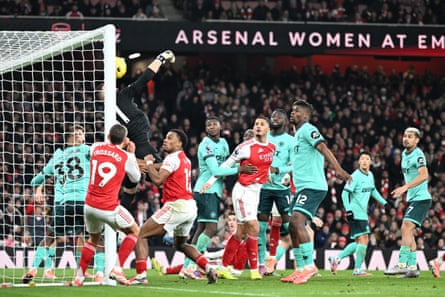 Sam Johnstone scores an own goal as Bukayo Saka’s corner bounces back off a post.