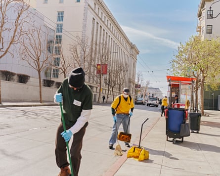 people clean the street