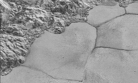  Sputnik Planum, a sea of frozen nitrogen near the Pluto’s equator, proved to be patterned by polygonal shapes, as seen in this image form the New Horizons mission.