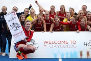 Great Britain captain Hollie Pearne-Webb holds a scroll reading ‘Welcome to Tokyo 2020” after their victory over Chile Women in November 2019 meant they qualifued for the Tokyo 2020 Olympic games.