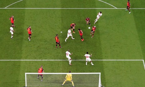 Tajon Buchanan shot hits the wrist of Belgium's Yannick Carrasco to concede a penalty kick to Canada.