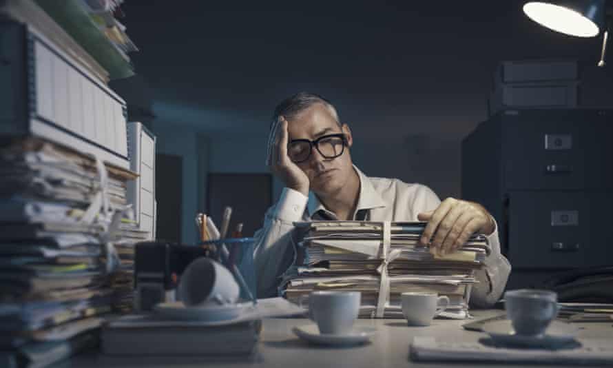 Bored man with paperwork