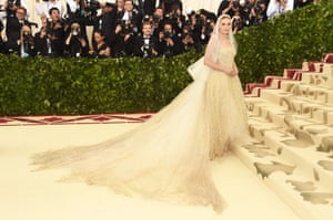 The ever ethereal Kate Bosworth called on Oscar de la Renta's designers Laura Kim and Fernando Garcia for her custom white gown, topped with a mantilla veil. The designers also worked with her on her wedding gown when she wed Michael Polish in 2013