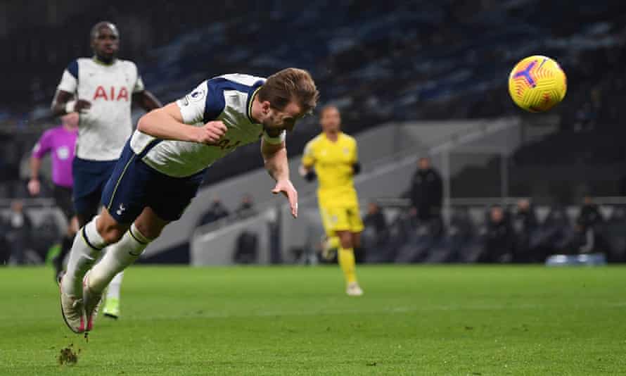 Harry Kane heads Tottenham in front.
