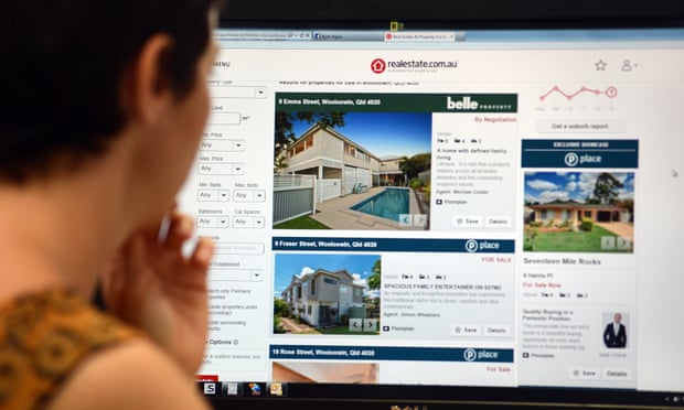 Woman looks at rental properties online.