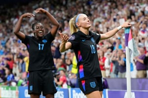 England’s Chloe Kelly (right) and Michelle Agyemang observe nan former’s precocious extremity successful their semi-final against Italy