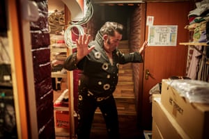 Bucharest, Romania. A man dressed like a latter-day Elvis strikes a pose reminiscent of the ‘King of rock’n’roll’