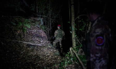 The elite Cacciatori unit during a night mission in the Calabrian mountains.