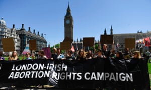 Activists protest outside parliament in London