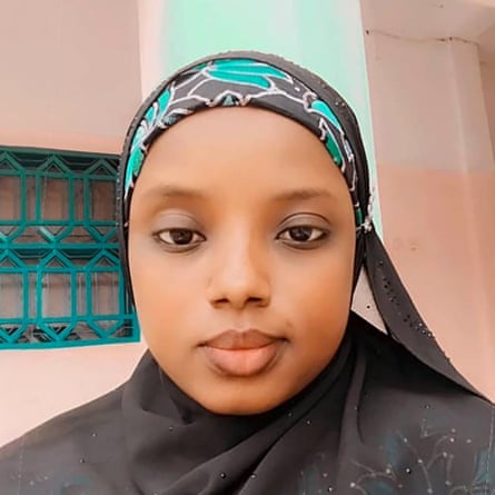 A woman wearing a head covering