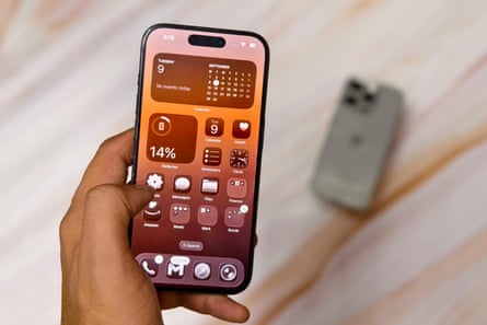 An iPhone 15 Pro with iOS 26.