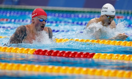 Adam Peaty races to a comfortable win in his 100m breaststroke heat in a time of 57.56 sec.