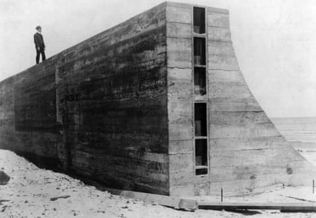 Man standing on portion of seawall built after the hurricane and flood of 1900, Galveston, Texas’, c. 1902.