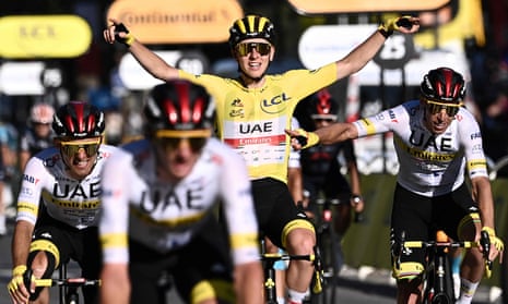 Tadej Pogacar celebrates his victory in the 2021 Tour de France on the Champs-Elysees at the end of the final stage.