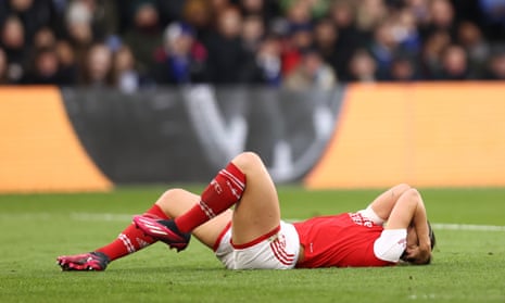 McCabe of Arsenal goes down injured.