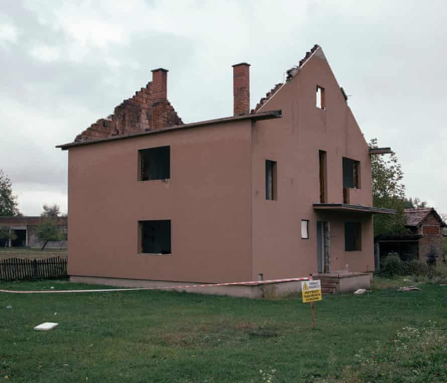 A vacant house without windows or a roof