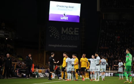 Wolves players protest during the VAR intervention which led to Hwang Hee-chan’s goal against Bournemouth in April being disallowed