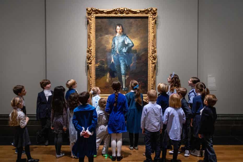 An electric storm of blueness … children pose in front of The Blue Boy at the National Gallery. 