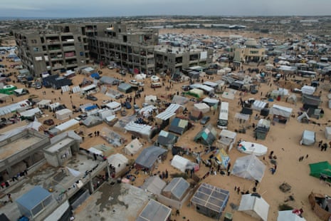 An aerial view of makeshift tents in open areas near the Egyptian border, in Rafah, Gaza.