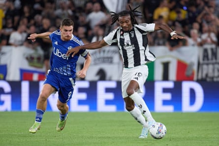 Khéphren Thuram holds off Alessandro Gabrielloni