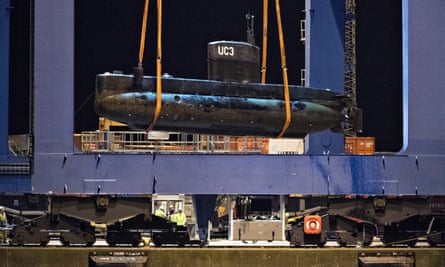 Metal monster: Madsen’s UC3 Nautilus is lifted onto a block truck from the salvage ship Vina.