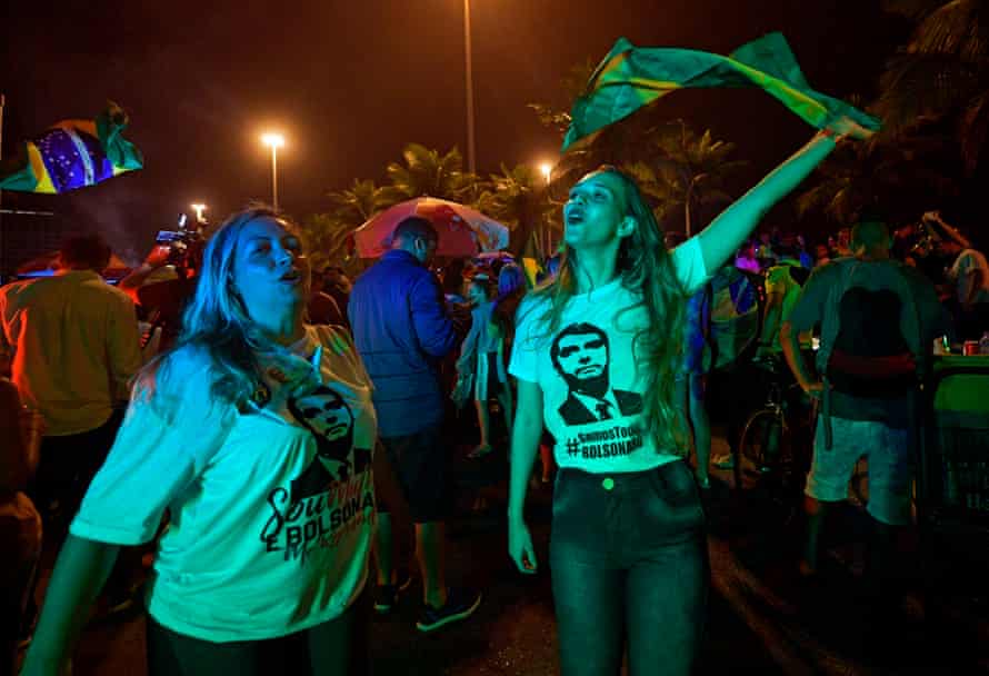 Bolsonaro supporters celebrate outside his home in Rio de Janeiro.
