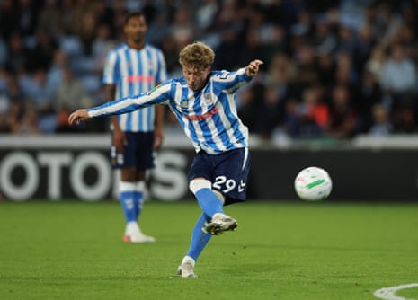 Coventry City's Victor Torp scores their first goal from a free-kick.