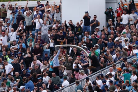 England fans with a snake of plastic beer cups in the stands at Headingley