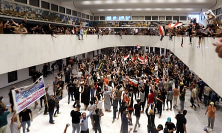 Demonstrators packed inside the Iraqi parliament building
