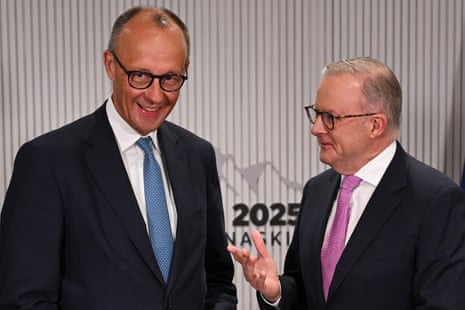 Anthony Albanese speaks with the chancellor of Germany, Friedrich Merz, during a bilateral meeting at the G7.