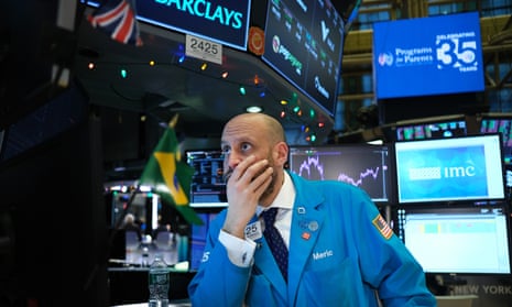 A NYSE trader looks worried as the US-Iran crisis pushes up oil prices.
