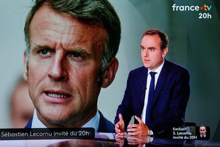 Sébastien Lecornu speaking on France 2 with an image of France’s President Emmanuel Macron in the background, 8 October, 2025.