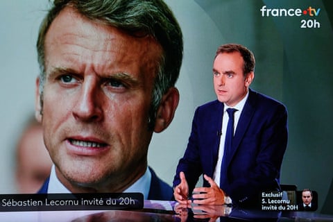Sébastien Lecornu speaking on France 2 with an image of France’s President Emmanuel Macron in the background, 8 October, 2025.