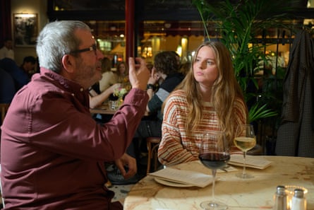 Steve and Eva chatting across a restaurant table