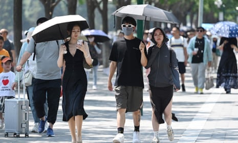 Northern China swelters in record temperatures | China | The Guardian